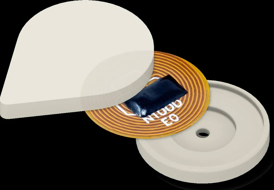 Cutaway illustration of a Touch-to-Travel pin showing the NFC chip inside the base